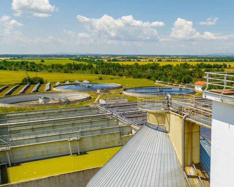 a photo of a waste treatment facility where waste water is fed into an anaerobic bioreactor