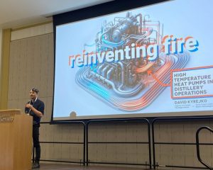 David Kyrejko presenting Reinventing fire: high temperature heat pumps in distillery operations for the James B. Beam foundation 2023 Industry Conference at the University of Kentucky